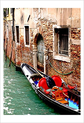 Gondola by a Brick Wall