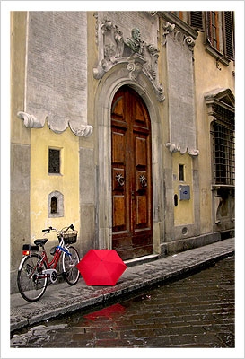 Red Umbrella & Bicycle at the Door