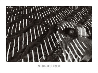 Asleep on Coney Island, New York, 1985 by Ferdinando Scianna