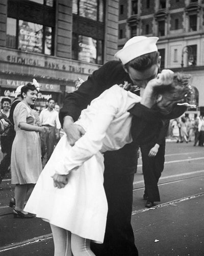 Framed Art Kissing the War Goodbye, 1945 by McMahan Photo Archive