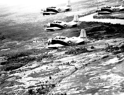 A-1 Skyraider Formation Over South Vietnam, 1965 by McMahan Photo A