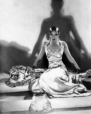 Framed Art Josephine Baker on Tiger Rug, 1925 by McMahan Photo Archive