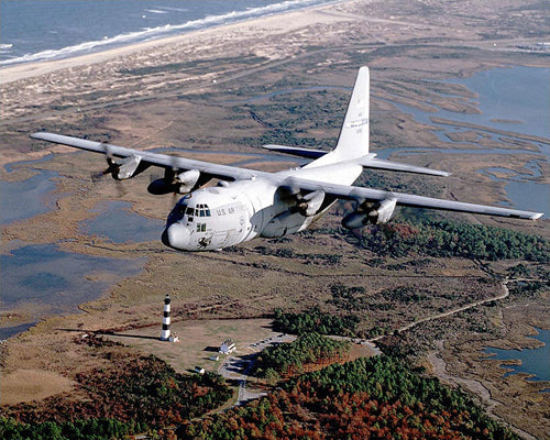 Framed Art C-130 Hercules Over Lighthouse, 2001 by McMahan Photo Archive
